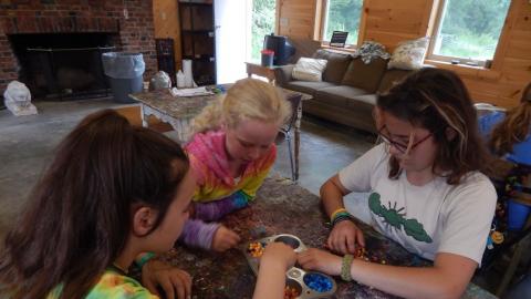 Girls making bracelets