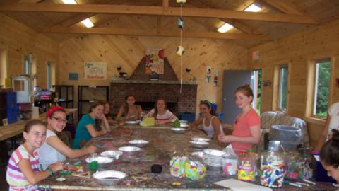 Youth work on arts and crafts projects. 