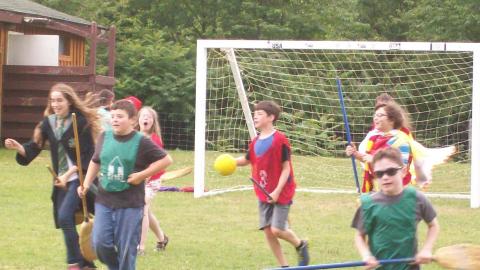 Campers playing Quidditch during Wizard Week at camp.