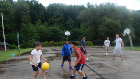 small group playing basketball.