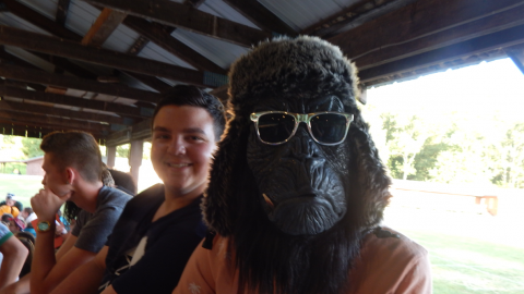 counselor wearing a gorilla mask.