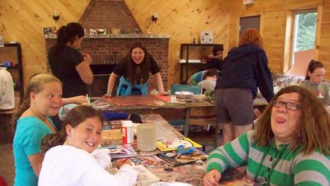 Youth work on crafts in the craft hall. 