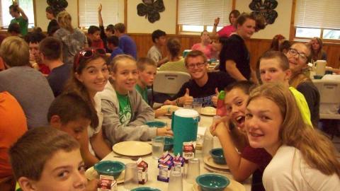 Campers wait for a meal in the camp dining hall. 