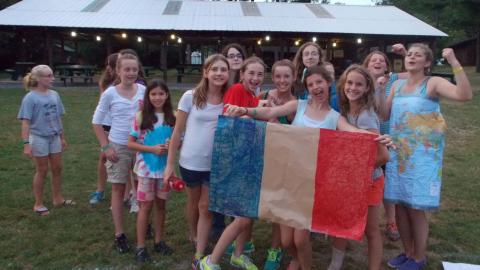 campers holding French Flag