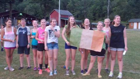 campers pose with handmade Irish flag